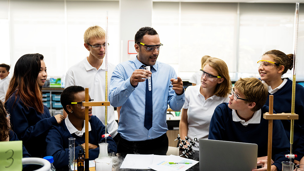 Teacher showing an experiment in a science lesson